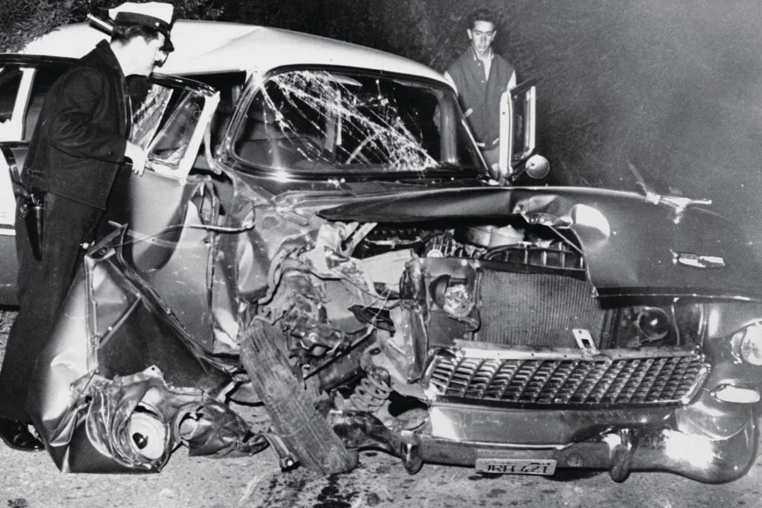 Los Angeles Police Department West Traffic Division investigating an accident In 1956, with Montgomery Clift. On the evening of May 12th, while filming Raintree County, Clift was involved in a serious car crash after leaving a dinner party hosted by Elizabeth Taylor and her husband, Michael Wilding. Clift had veered off one of the twisting hairpin turns and smashed into a telephone pole and the surrounding cliffside.